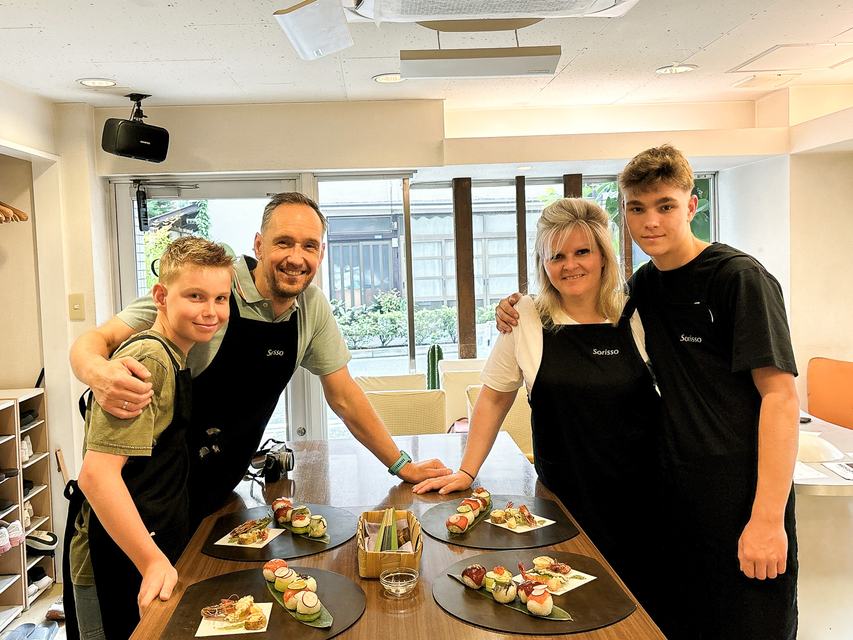 A family with the temari sushi they made at Sorisso
