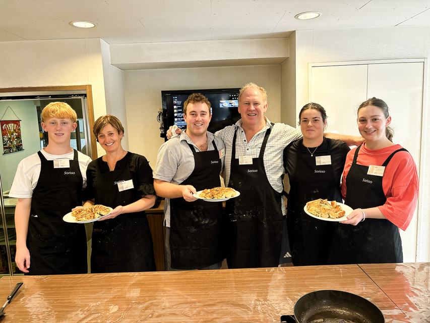A family of six with the gyoza they made