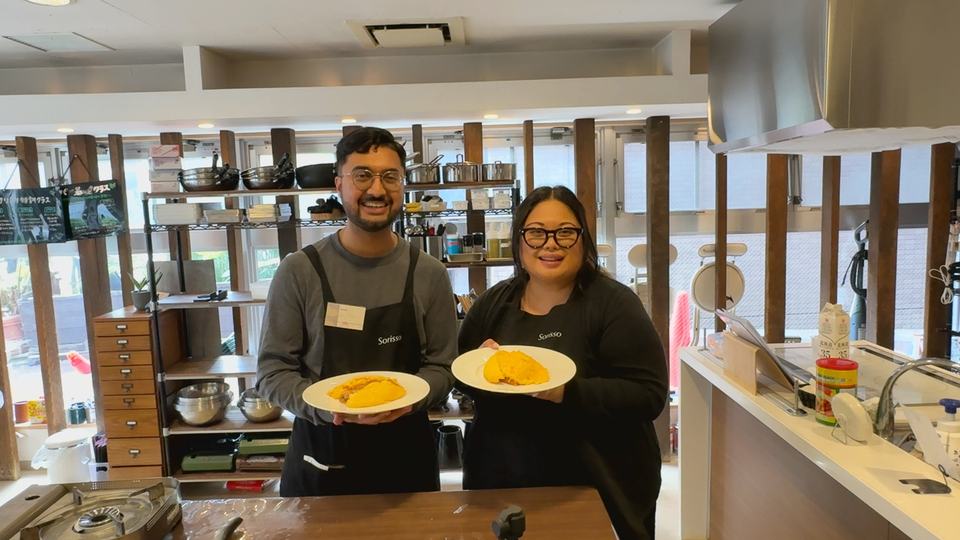 A couple with their homemade omurice