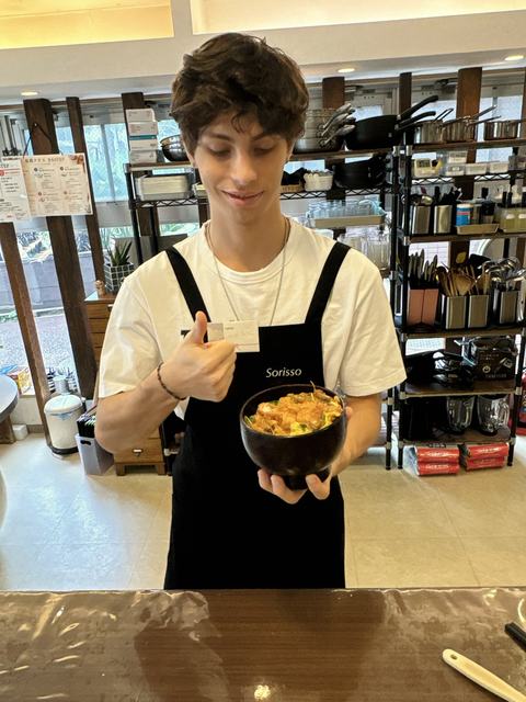 A guest with the katsudon he made
