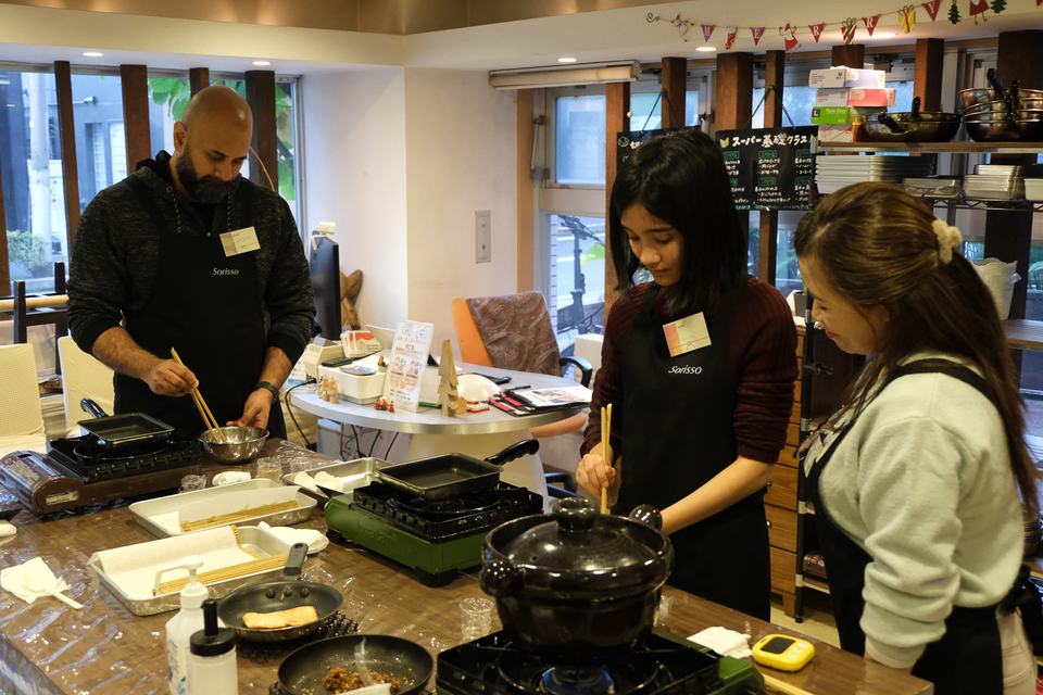 Guests at a Japanese cooking at Sorisso in Tokyo